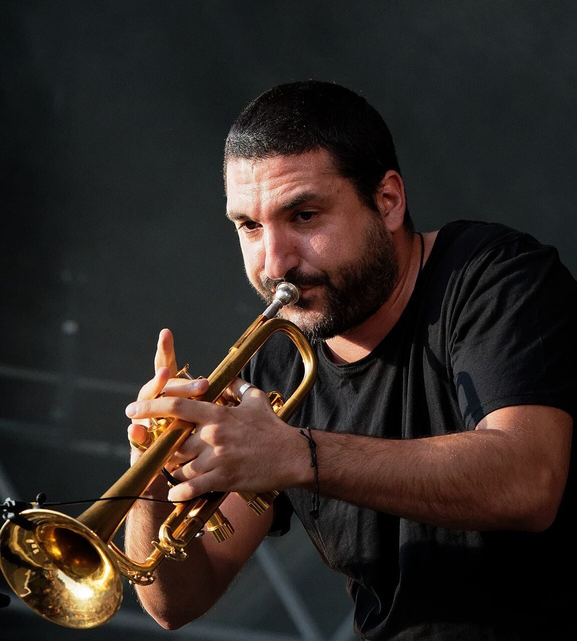 Ibrahim Maalouf playing the trumpet on stage